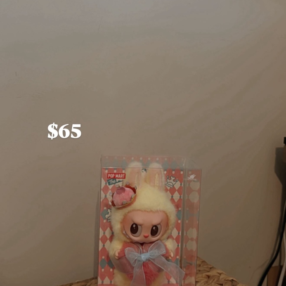 Cute Yellow and Pink Figure with Bow